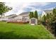 Well maintained backyard with a tool shed and large deck perfect for relaxing or entertainment at 8810 Cool Meadow Dr, Huntersville, NC 28078