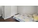 Cozy bedroom with wood-look floors and closet for ample storage space at 9312 Seamill Rd, Charlotte, NC 28278