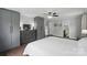 Spacious main bedroom features hardwood floors, ceiling fan and ensuite access at 9312 Seamill Rd, Charlotte, NC 28278