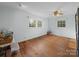 Bedroom with hardwood floors and natural light streaming through the windows at 101 Stoneybrook Dr, York, SC 29745