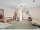 Bedroom featuring hard wood flooring, ceiling fan, and closet at 101 Stoneybrook Dr, York, SC 29745