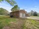 Brick house with a two-car garage and an attached carport offers ample parking space and storage at 101 Stoneybrook Dr, York, SC 29745