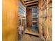 Unfinished storage area showing exposed framing and utility shelving at 101 Stoneybrook Dr, York, SC 29745