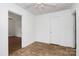 Bedroom showcasing neutral walls, a white door, and modern flooring at 1043 Sid Davis Rd, Chester, SC 29706