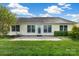 Home exterior featuring a large backyard with well-kept lawn at 113 Hidden Creek Dr, Salisbury, NC 28147