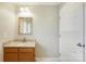 Neutral bathroom featuring granite countertop, mirror, and white door at 113 Hidden Creek Dr, Salisbury, NC 28147