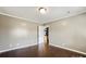 Cozy bedroom with hardwood floors and a neutral color scheme at 113 Hidden Creek Dr, Salisbury, NC 28147