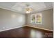 Bedroom with ceiling fan, hardwood floors, and a window at 113 Hidden Creek Dr, Salisbury, NC 28147