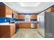 Well-equipped kitchen with stainless steel appliances, light wood cabinets, and granite countertops at 113 Hidden Creek Dr, Salisbury, NC 28147