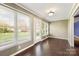 Bright and airy sunroom with hardwood floors, great for enjoying the outdoors from inside at 113 Hidden Creek Dr, Salisbury, NC 28147