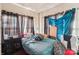 Bedroom featuring hardwood floors and a window allowing natural light at 115 E 11Th St, Salisbury, NC 28144