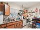 Kitchen featuring ample cabinetry, a stainless steel sink, and a window offering natural light at 115 E 11Th St, Salisbury, NC 28144