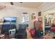 Living area offering a glimpse into the bedroom, featuring hardwood floors and neutral wall colors at 115 E 11Th St, Salisbury, NC 28144