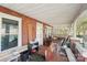Covered front porch with classic details, perfect for relaxing and enjoying the outdoors at 115 E 11Th St, Salisbury, NC 28144