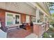 Inviting front porch with decorative accents, creating a cozy and welcoming outdoor space at 115 E 11Th St, Salisbury, NC 28144