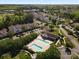See the community pool and gathering area, along with parking, and landscaping at 11839 Ridgeway Park Dr, Charlotte, NC 28277