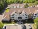 An aerial view of the multi-Gathering home shows the roof, balconies, and landscaping at 11839 Ridgeway Park Dr, Charlotte, NC 28277