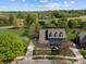 Stunning aerial view of a well-maintained home with lush green lawn and mature trees at 135 Northbridge Dr, Mooresville, NC 28115