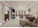 Bright living room featuring a fireplace, bay windows, and neutral color palette at 135 Northbridge Dr, Mooresville, NC 28115