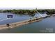 Breathtaking aerial view of a bridge over a lake, showing waterfront properties and lush surroundings at 143 S Gibbs Rd, Mooresville, NC 28117