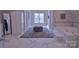 Bright bathroom boasts marble floors, walk in tub, and natural light from the awning windows at 143 S Gibbs Rd, Mooresville, NC 28117