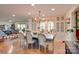 Dining room with hardwood floors, built-in cabinets, and view of living room at 1473 12Th Street Nw Dr, Hickory, NC 28601