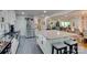 Bright kitchen featuring an island with seating and modern stainless steel appliances at 1473 12Th Street Nw Dr, Hickory, NC 28601