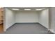Unfinished room in basement with concrete floors and white walls at 1473 12Th Street Nw Dr, Hickory, NC 28601