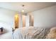 Cozy bedroom view leading into the bathroom showcasing an open floor plan and neutral tones at 17712 Yarwill Ct, Charlotte, NC 28278