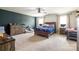 Spacious bedroom with a ceiling fan, lots of natural light, and nice furnishings at 17712 Yarwill Ct, Charlotte, NC 28278