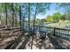 Inviting deck area with chairs, offering beautiful views of the lake at 179 Abington Ln, Troutman, NC 28166