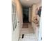 Charming hallway with built-in storage, a windowed door, and neutral tones, offering a welcoming transition space at 179 Abington Ln, Troutman, NC 28166
