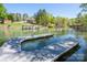 Wonderful lake view with docks and seating, creating a serene waterfront scene at 179 Abington Ln, Troutman, NC 28166