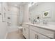 Bright bathroom featuring double sinks, a shower and a toilet at 217 Halemarg Dr, Belmont, NC 28012