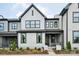 Charming two-story home with modern farmhouse-style exterior, featuring a welcoming front porch at 217 Halemarg Dr, Belmont, NC 28012