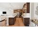 Modern kitchen features a large center island, stainless steel appliances, and sleek countertops at 217 Halemarg Dr, Belmont, NC 28012