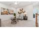 Cozy upstairs living room features a comfortable couch, neutral carpet, and stylish decorative accents at 217 Halemarg Dr, Belmont, NC 28012