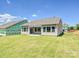 New construction home featuring a spacious backyard and patio for outdoor entertaining and relaxation at 2229 Camber Dr # Cwo0100, Gastonia, NC 28054