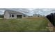 Expansive backyard features newly installed grass and landscaping, ideal for outdoor activities at 2229 Camber Dr # Cwo0100, Gastonia, NC 28054