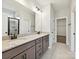 Bathroom featuring a double vanity, walk-in shower, and tile flooring at 2229 Camber Dr # Cwo0100, Gastonia, NC 28054