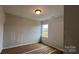Bright bedroom features a window offering natural light, showcasing the construction phase of the home at 2229 Camber Dr # Cwo0100, Gastonia, NC 28054