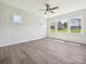 Bedroom features hardwood flooring, neutral paint, and lots of natural light at 2229 Camber Dr # Cwo0100, Gastonia, NC 28054