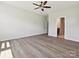 Spacious bedroom with hardwood floors, neutral paint, and bathroom access at 2229 Camber Dr # Cwo0100, Gastonia, NC 28054