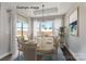 Elegant dining room with tray ceiling, large windows with backyard views, and stylish seating for sophisticated gatherings at 2229 Camber Dr # Cwo0100, Gastonia, NC 28054