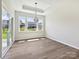 Dining room features large windows and a sliding glass door for outdoor access at 2229 Camber Dr # Cwo0100, Gastonia, NC 28054