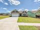Charming single-story home with a well-manicured lawn and a two-car garage at 2229 Camber Dr # Cwo0100, Gastonia, NC 28054