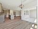 An open-concept kitchen with an island that flows into the spacious dining and living areas, enhancing functionality at 2229 Camber Dr # Cwo0100, Gastonia, NC 28054