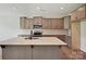Modern kitchen featuring a spacious island, stainless steel appliances, and ample cabinet space at 2229 Camber Dr # Cwo0100, Gastonia, NC 28054