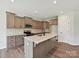 Well-lit kitchen with a large center island, modern appliances, and ample counter space at 2229 Camber Dr # Cwo0100, Gastonia, NC 28054