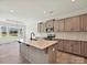 Bright modern kitchen with an island, stainless steel appliances, and sleek cabinetry at 2229 Camber Dr # Cwo0100, Gastonia, NC 28054